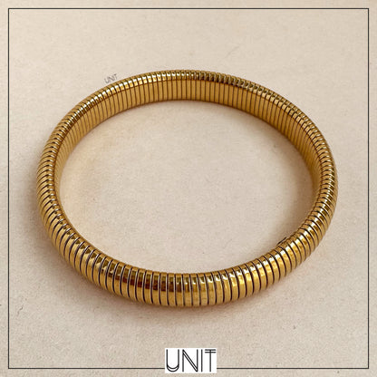 Solene Ribbed Gold Coil Bangle
